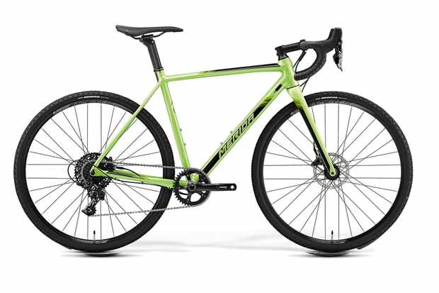 Green cyclocross bike by Merida on a white background